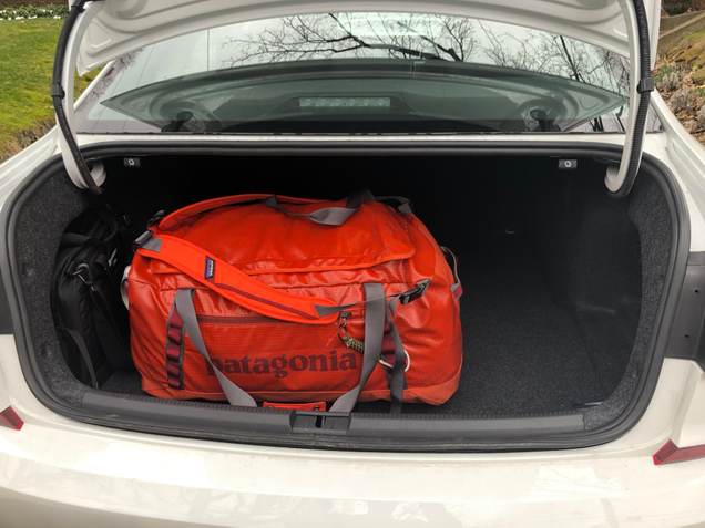 My Patagonia Black Hole duffel is not small. Packed full, it is holding close to 40 pounds of clothes and I’ve lived out of it for over a week at a time. I could’ve fit at least six of them in there.